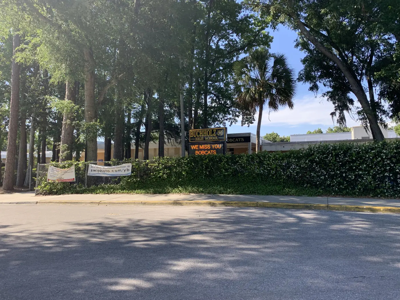 The F.W. Buchholz High School sign behind the hedge on NW 27th Avenue in Gainesville