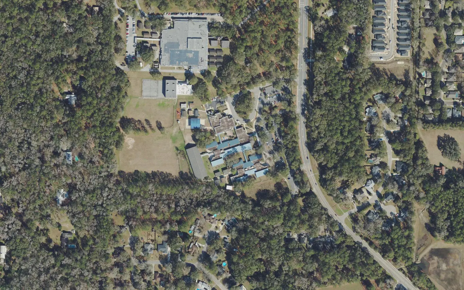 Hidden Oak Elementary School, center, beside Fort Clarke Middle School, top, west of Gainesville, seen from the air