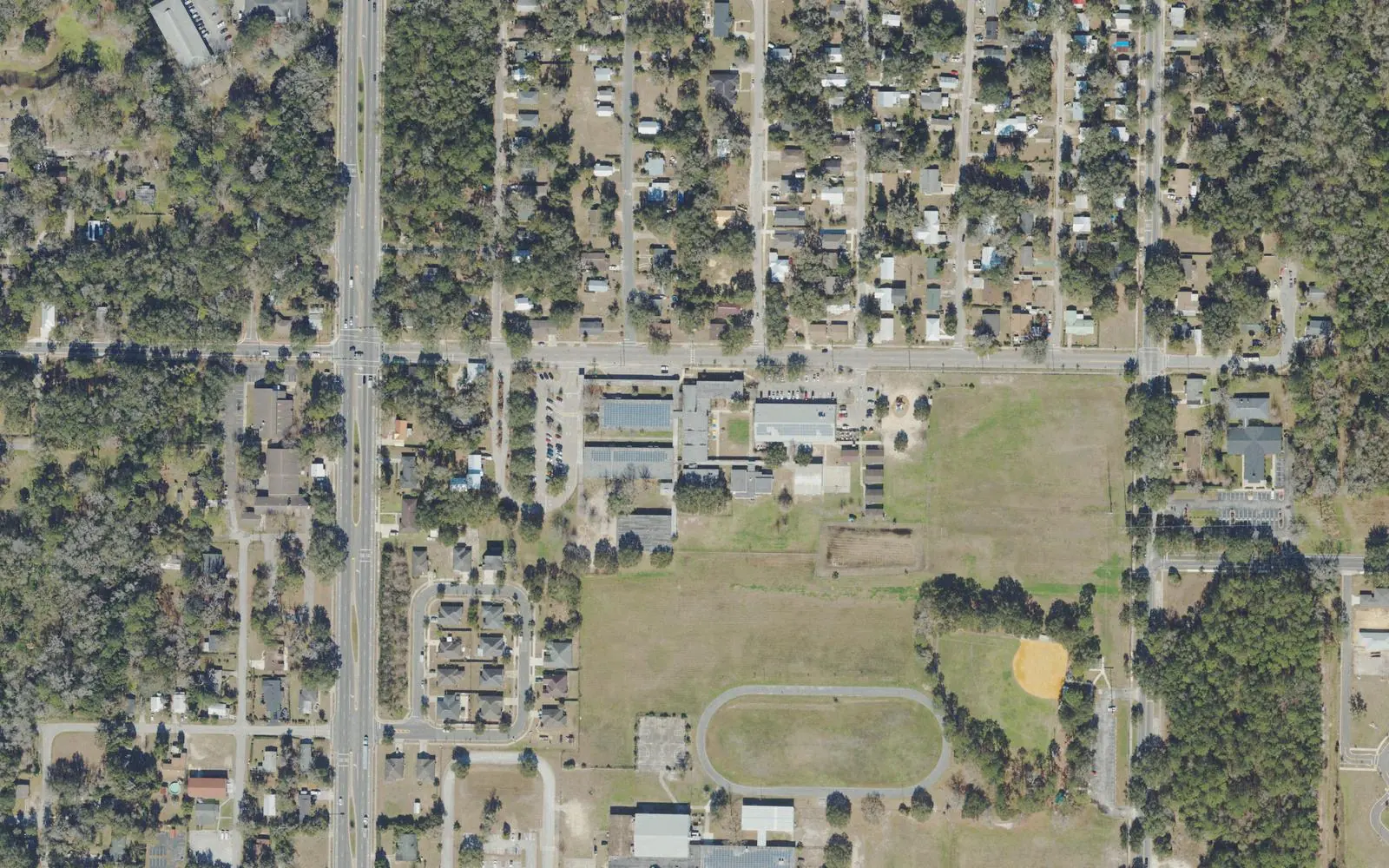 Joseph Williams Elementary School on SE Seventh Avenue in Gainesville, with Lincoln Middle's track to the south, seen from the air