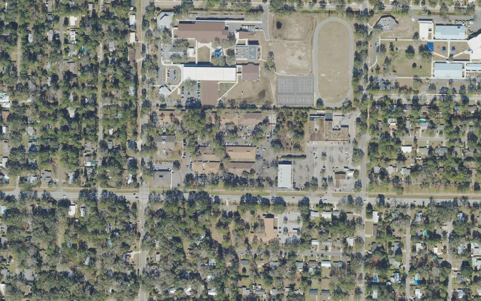 The area around North Central Florida Public Charter School on NE 16th Avenue in Gainesville, with Howard W. Bishop Middle School to the north, seen from the air